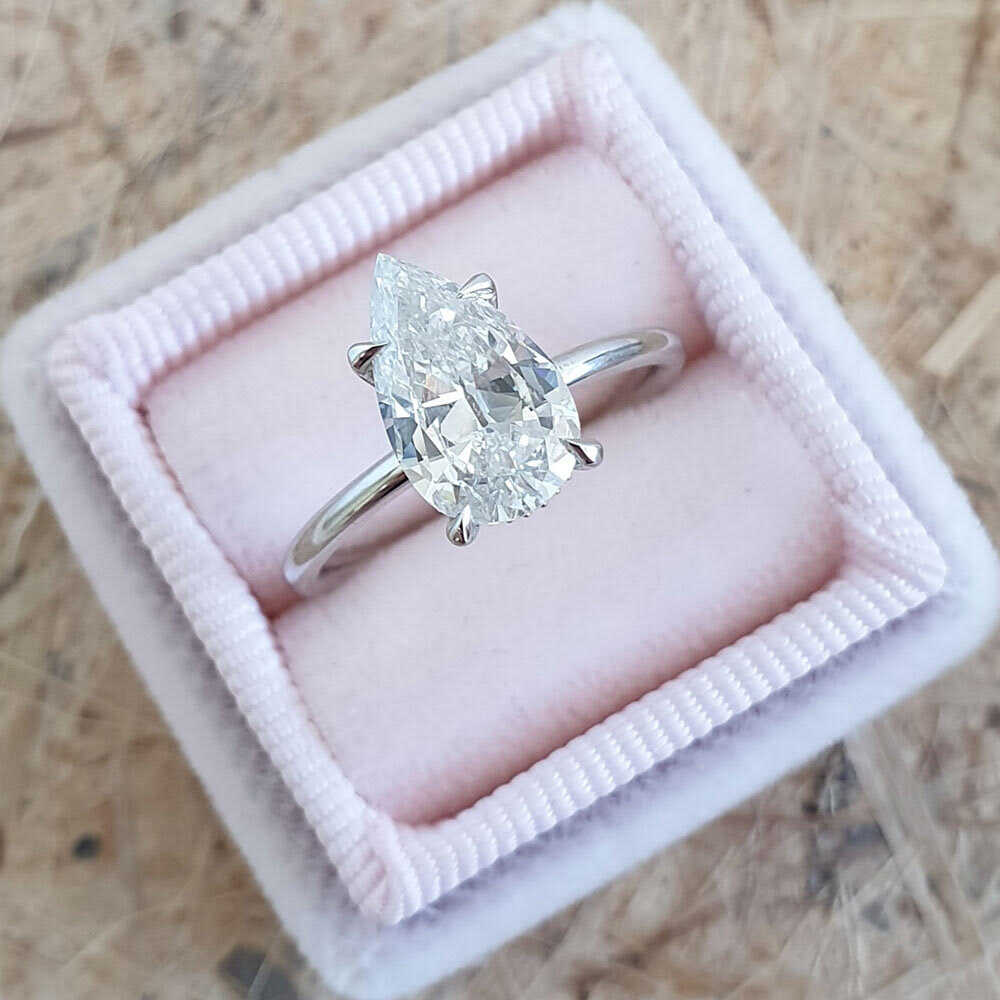 PEAR CUT SOLITAIRE DIAMOND RING & OTHER JEWELRY