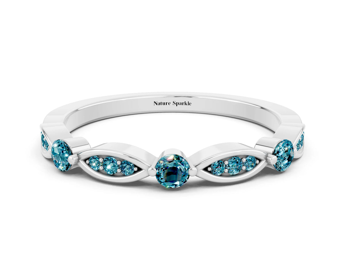 Alternating Marquise and Round Blue Topaz Milgrain Band in White gold with Bezel Setting