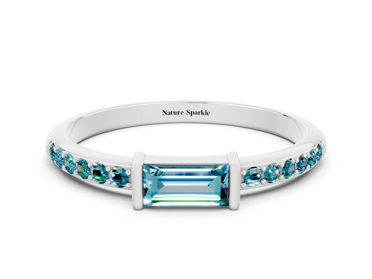 Baguette Blue Topaz Pavé Band in White gold with Bar Setting