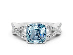 Cushion Cut Aquamarine Solitaire Ring in White gold with Interwoven Pavé Band and Prong Setting