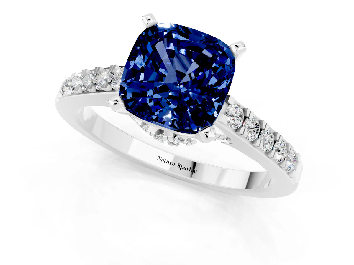 Cushion Cut Blue Sapphire Solitaire Ring in Platinum with Crossover Gallery and Round Pavé Band_1