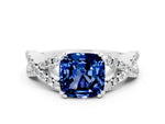 Cushion Cut Blue Sapphire Solitaire Ring in White gold with Interwoven Pavé Band and Prong Setting