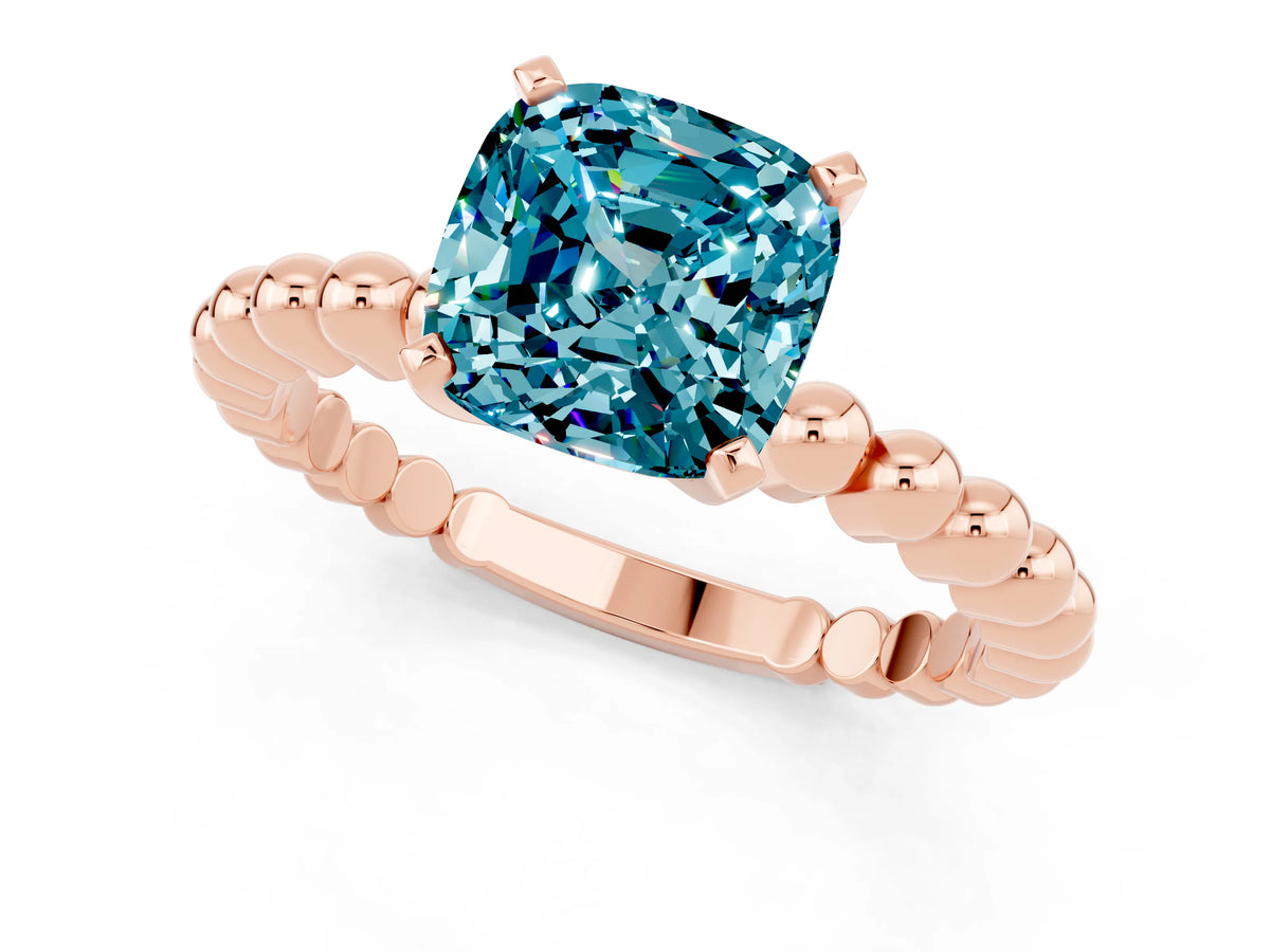 Cushion Cut Blue Topaz Solitaire Ring in Rose gold with Textured Beaded Band and Prong Setting_1