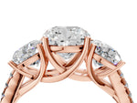 Cushion Cut Diamond Trellis Three-Stone Engagement Ring in Rose gold with Round Side Stones_22