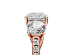 Cushion Cut Diamond Trellis Three-Stone Engagement Ring in Rose gold with Round Side Stones_23