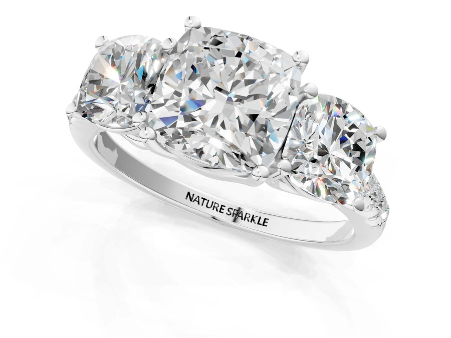 Cushion Cut Diamond Trellis Three-Stone Engagement Ring in Platinum with Round Side Stones