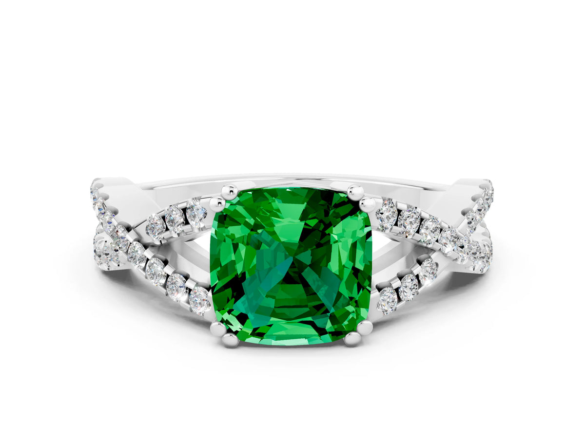 Cushion Cut Emerald Solitaire Ring in White gold with Interwoven Pavé Band and Prong Setting