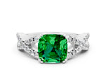 Cushion Cut Emerald Solitaire Ring in White gold with Interwoven Pavé Band and Prong Setting