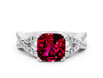 Cushion Cut Garnet Solitaire Ring in White gold with Interwoven Pavé Band and Prong Setting