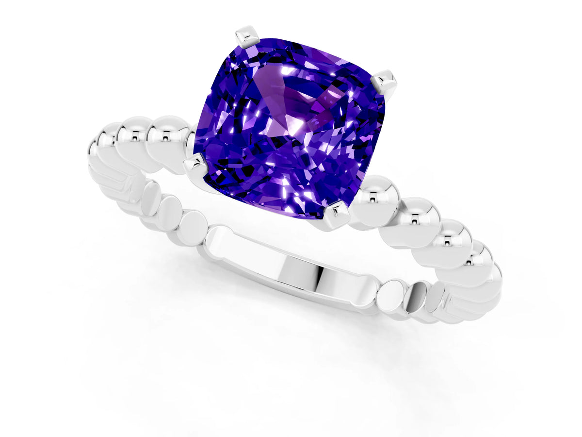 Cushion Cut Tanzanite Solitaire Ring in Platinum with Textured Beaded Band and Prong Setting_1