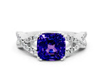 Cushion Cut Tanzanite Solitaire Ring in White gold with Interwoven Pavé Band and Prong Setting