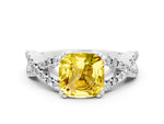 Cushion Cut Yellow Sapphire Solitaire Ring in White gold with Interwoven Pavé Band and Prong Setting