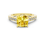 Cushion Cut Yellow Sapphire Solitaire Ring in Yellow gold with Crossover Gallery and Round Pavé Band
