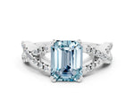 Emerald Cut Aquamarine Solitaire Ring in White gold with Interwoven Pavé Band and Prong Setting