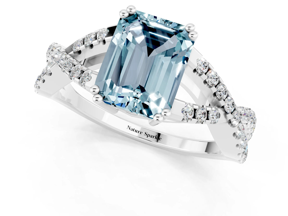 Emerald Cut Aquamarine Solitaire Ring in White gold with Interwoven Pavé Band and Prong Setting_1
