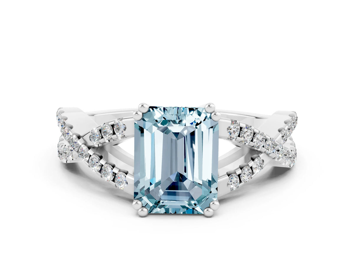 Emerald Cut Aquamarine Solitaire Ring in White gold with Interwoven Pavé Band and Prong Setting