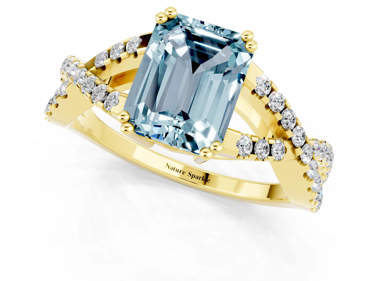 Emerald Cut Aquamarine Solitaire Ring in Yellow gold with Interwoven Pavé Band and Prong Setting_1