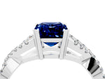 Emerald Cut Blue Sapphire Solitaire Ring in Platinum with Interwoven Pavé Band and Prong Setting_10