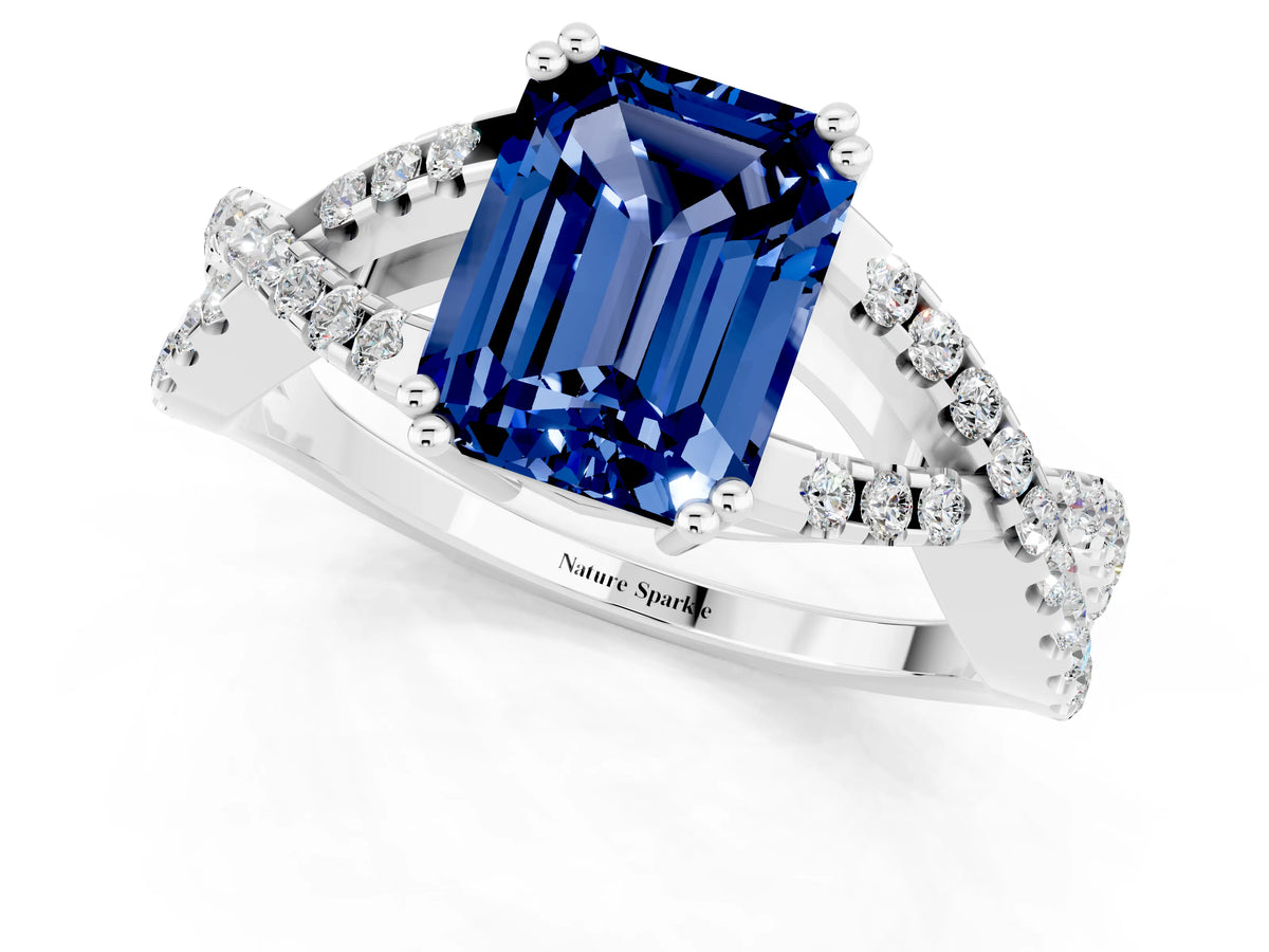 Emerald Cut Blue Sapphire Solitaire Ring in White gold with Interwoven Pavé Band and Prong Setting_1