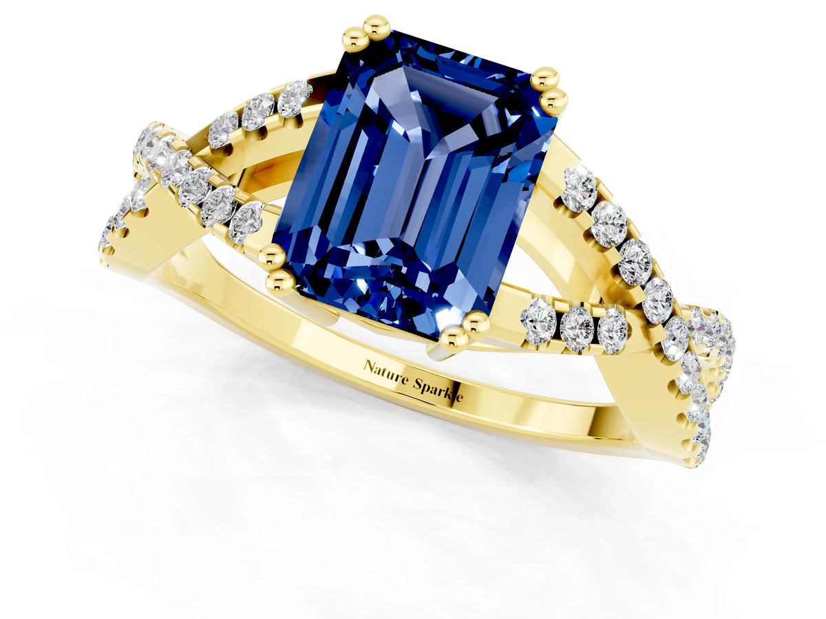Emerald Cut Blue Sapphire Solitaire Ring in Yellow gold with Interwoven Pavé Band and Prong Setting_1