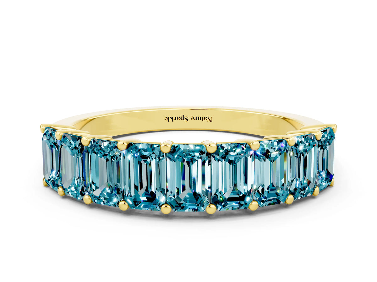 Emerald Cut Blue Topaz Eternity Band in Yellow gold with Prong Setting