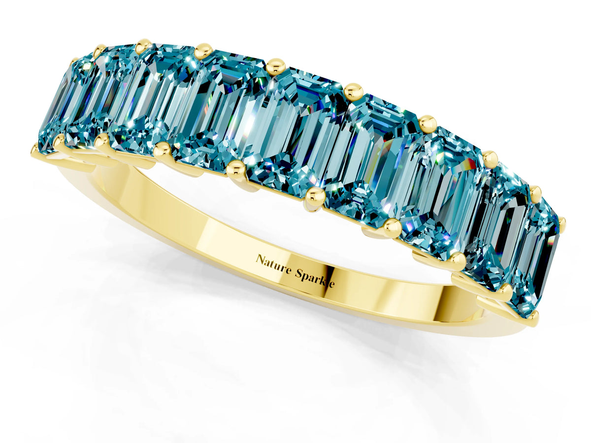 Emerald Cut Blue Topaz Eternity Band in Yellow gold with Prong Setting_1