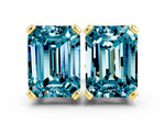 Emerald Cut Blue Topaz Stud Earrings in Yellow gold with Basket Setting