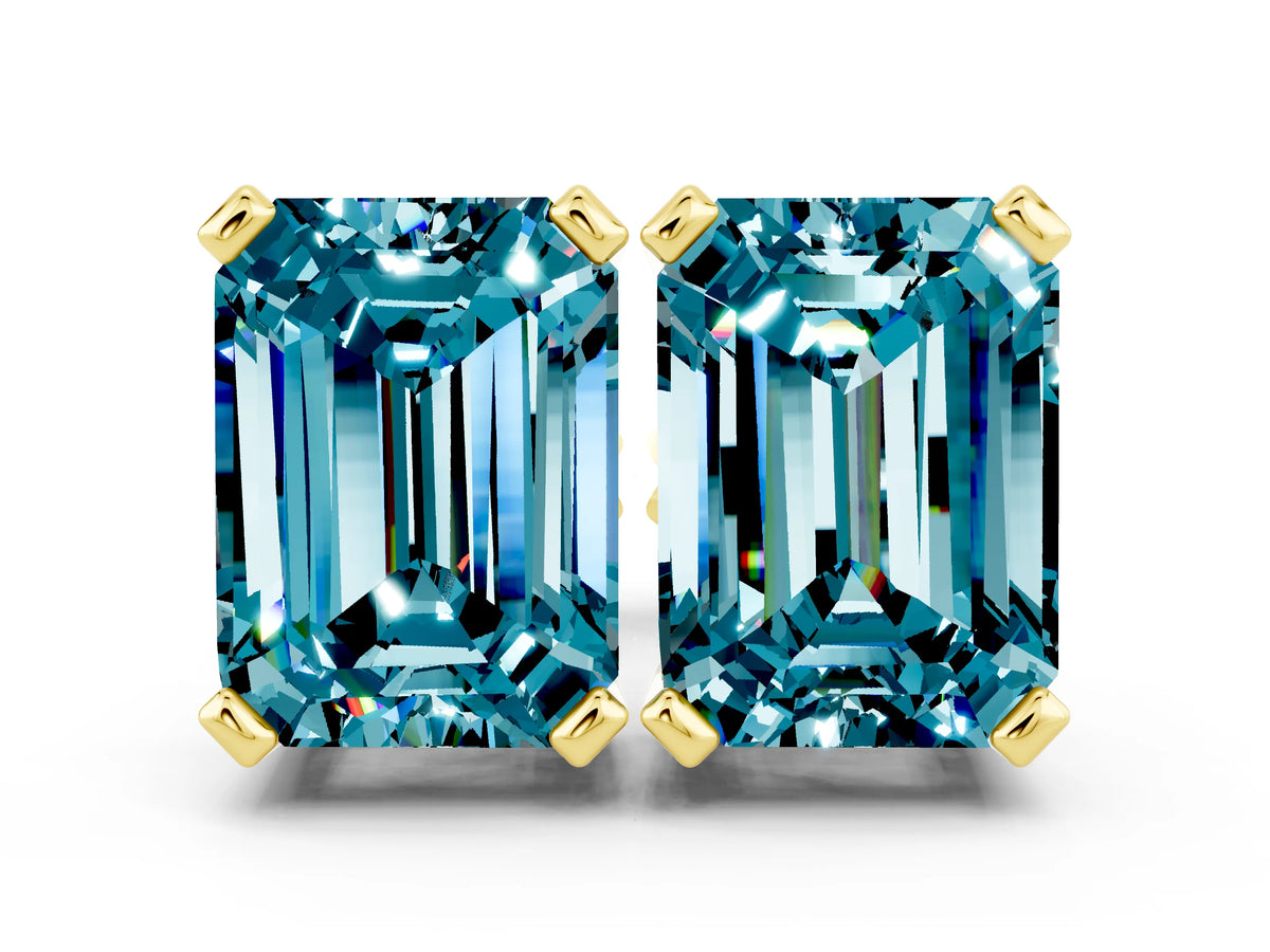 Emerald Cut Blue Topaz Stud Earrings in Yellow gold with Basket Setting