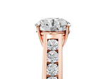 Emerald Cut Diamond Solitaire Engagement Ring in Rose gold with Channel-Set Band and Prong Setting_5