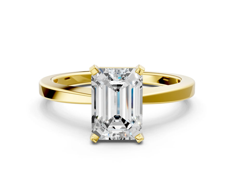 Emerald Cut Diamond Solitaire Engagement Ring in Yellow gold with Prong Setting