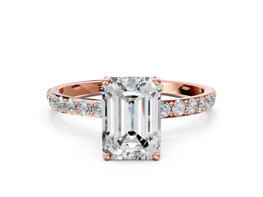 Emerald Cut Diamond Solitaire Ring in Rose gold with Round Shared Prong Pavé Band