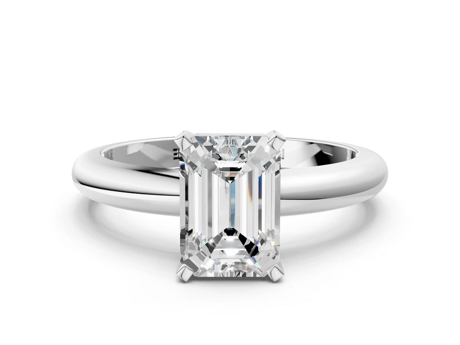 Emerald Cut Diamond Solitaire Ring in White gold with Prong Setting and Rounded Band
