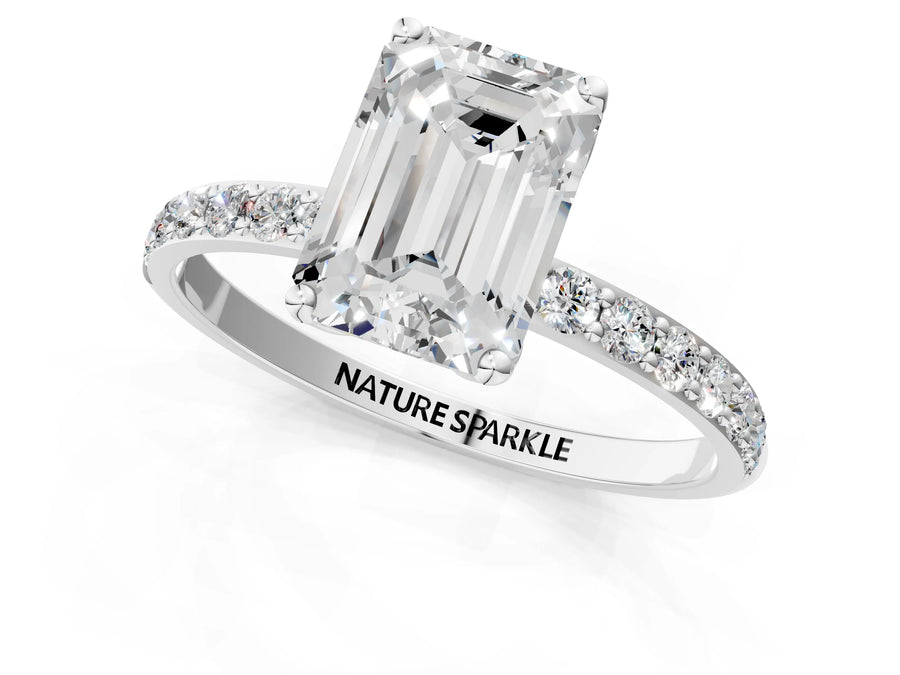 Emerald Cut Diamond Solitaire Ring in Platinum with Round Shared Prong Pavé Band