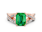 Emerald Cut Emerald Solitaire Ring in Rose gold with Interwoven Pavé Band and Prong Setting