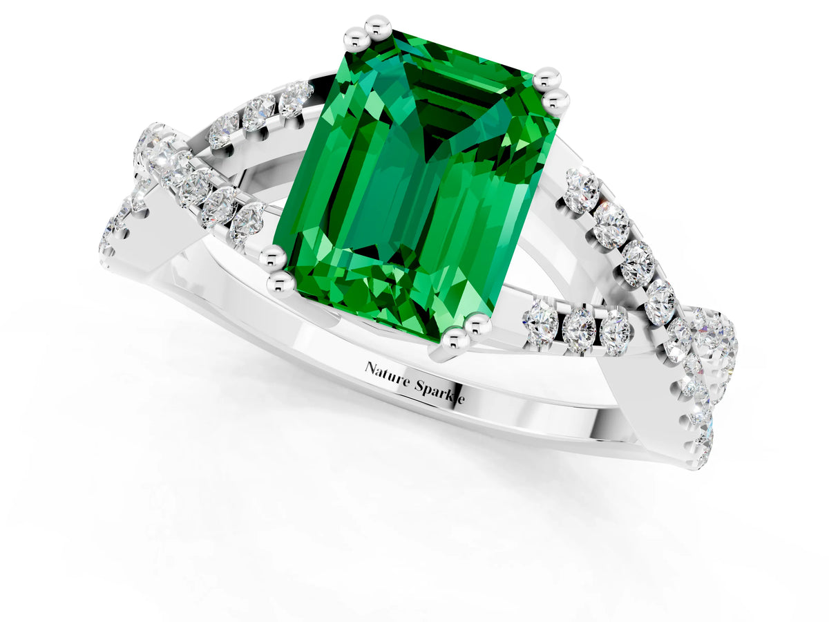 Emerald Cut Emerald Solitaire Ring in Silver with Interwoven Pavé Band and Prong Setting_7