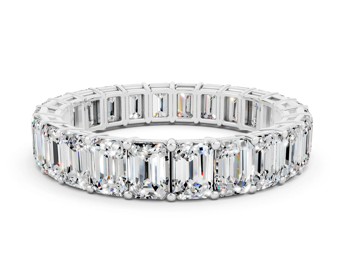 Emerald Cut Moissanite Eternity Band in Platinum with Aligned Shared Prong Setting