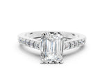 Emerald Cut Moissanite Solitaire Ring in White gold with Crossover Gallery and Round Pavé Band