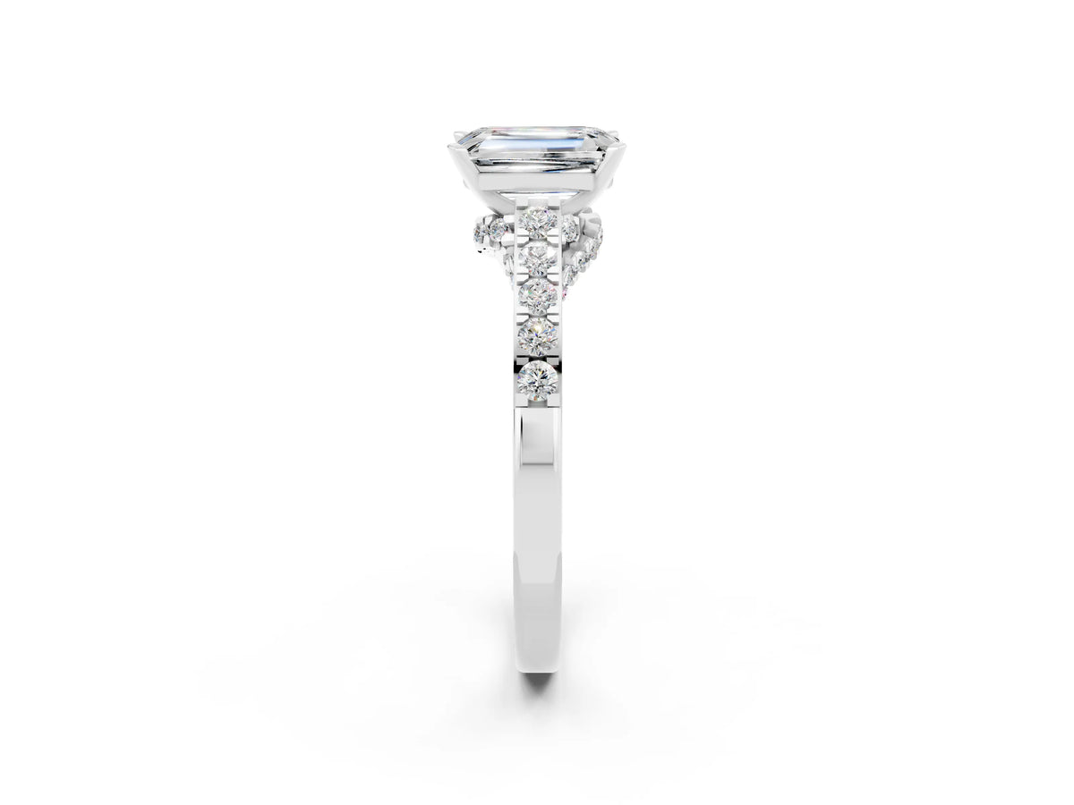Emerald Cut Moissanite Solitaire Ring in White gold with Crossover Gallery and Round Pavé Band_2