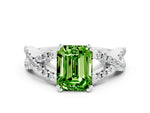 Emerald Cut Peridot Solitaire Ring in White gold with Interwoven Pavé Band and Prong Setting