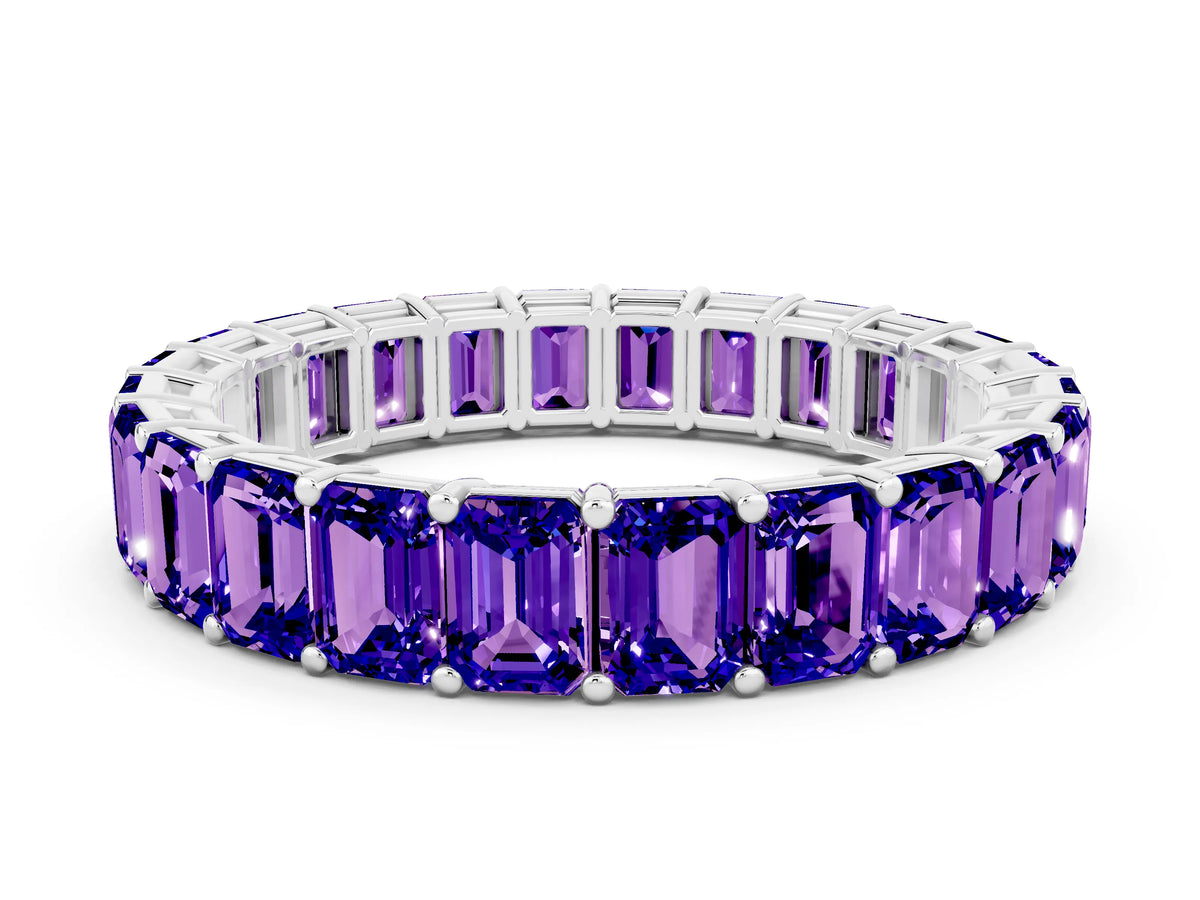 Emerald Cut Tanzanite Eternity Band in White gold with Aligned Shared Prong Setting