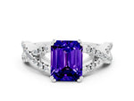 Emerald Cut Tanzanite Solitaire Ring in White gold with Interwoven Pavé Band and Prong Setting