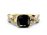 Fancy Black Cushion Cut Diamond Solitaire Ring in Yellow gold with Interwoven Pavé Band and Prong Setting