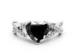 Fancy Black Heart Cut Diamond Solitaire Ring in White gold with Interwoven Pavé Band and Prong Setting