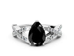 Fancy Black Pear Cut Diamond Solitaire Ring in White gold with Interwoven Pavé Band and Prong Setting