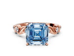 Fancy Blue Asscher Cut Diamond Solitaire Ring in Rose gold with Twisted Ribbon Band and Round Accents