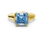 Fancy Blue Asscher Cut Diamond Solitaire Ring in Yellow gold with Smooth Wide Band and Prong Setting