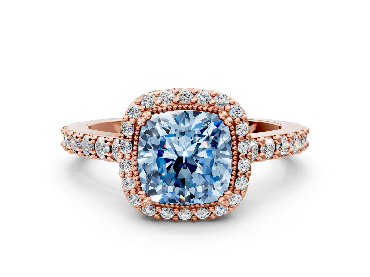 Fancy Blue Cushion Cut Diamond Halo Engagement Ring in Rose gold with Milgrain Detail and Pavé Band