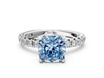 Fancy Blue Cushion Cut Diamond Pavé Solitaire Ring in White gold with Round Pavé Band and Prong Setting