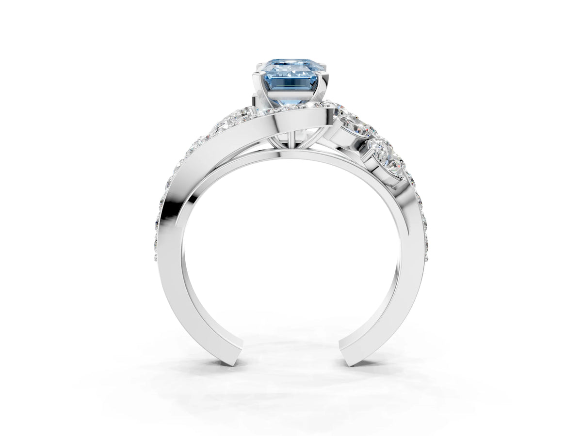 Fancy Blue Emerald Cut Diamond Halo Ring in White gold with Marquise and Pavé Band in Prong Setting_3