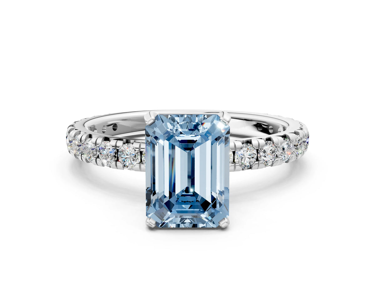 Fancy Blue Emerald Cut Diamond Pavé Solitaire Ring in White gold with Round Pavé Band and Prong Setting